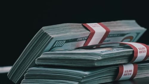 Stacks of United States Hundred Dollar Currency