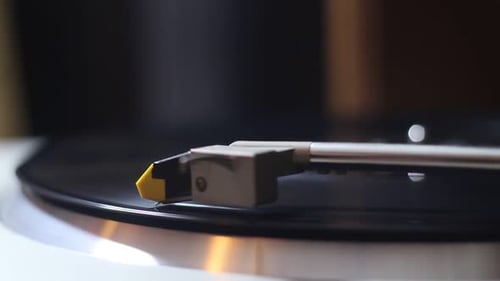 Close Up of Record Player Needle Playing Record