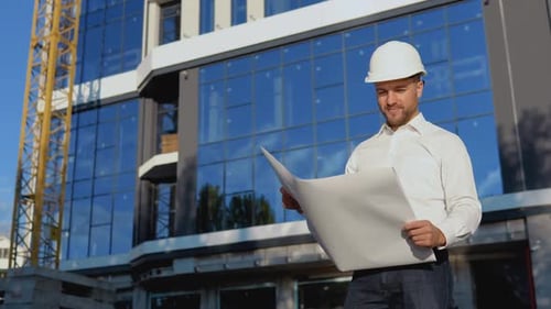 Architect Engineer Reads Project Drawings