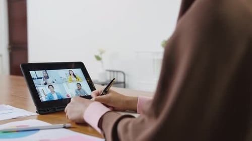 Woman Having Video Conference on Tablet