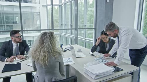 Business Professionals Having a Meeting in a Modern Office