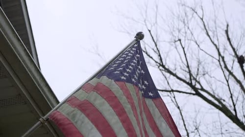 American Flag Waving on Residential Home