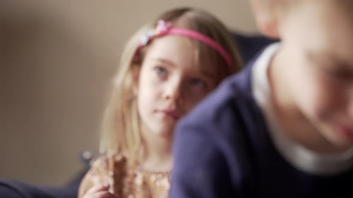 Childhood: Boy and Girl Together Indoors