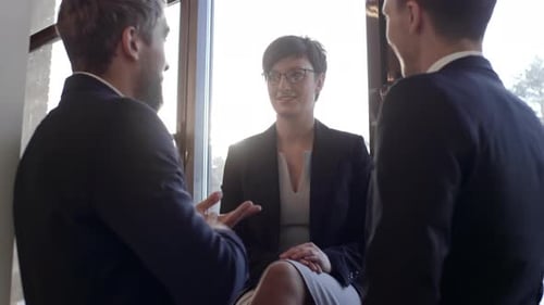 Business Team Talking in Modern Office