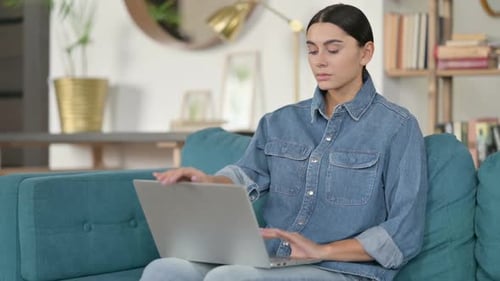 Latin Woman Closing Laptop Leaving
