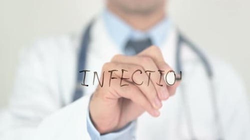 Doctor Writes Infection On Glass Screen