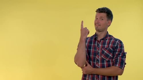 Man Thinks Hard, Has Idea, Gives Thumbs Up
