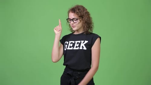 Enthusiastic Woman Presenting on Green Screen