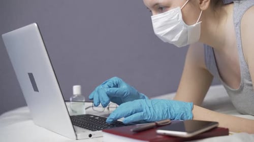 The Manager Works at Home Uses a Laptop To Answer Customer Questions