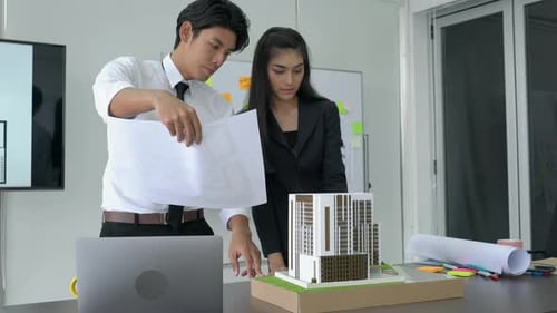 Business man and woman working in office