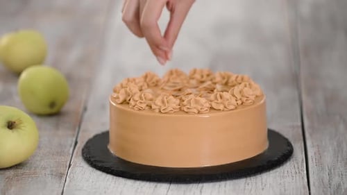 Decorating Delicious Caramel Glazed Cake with Small Toppings