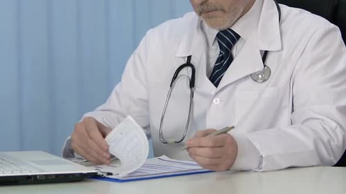 Professional Therapist Writing Prescription for Patient, Keeping Medical Records