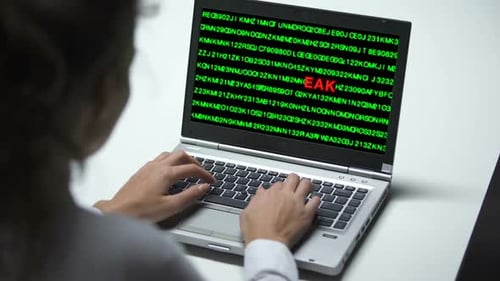 Data Leak on Laptop Computer, Woman Working in Office, Cybercrime, Close Up