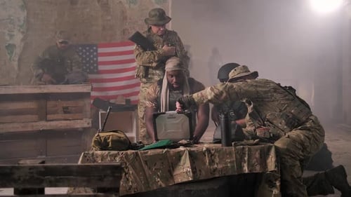 Soldiers Strategizing in Smoke-Filled Urban Setting