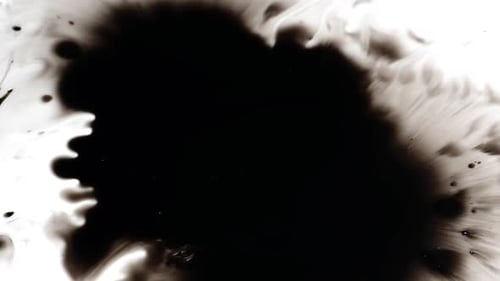 Abstract Ink Spread on White Background