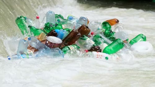 Pollution By Plastic Garbage Bottles in the River