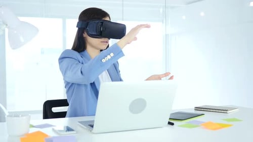 Wearing Virtual Reality Glasses in Office. Using VR Goggles Headset