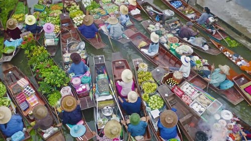 Damnoen Saduak Floating Market or Amphawa. Local people sell fruits, traditional food on boats