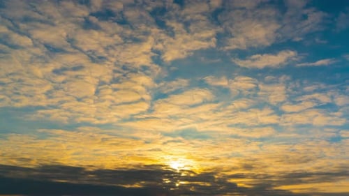 Sunrise Time Lapse with Golden Glowing Clouds