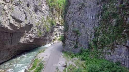 Aerial Shot of Mountain River and Road in Gorge