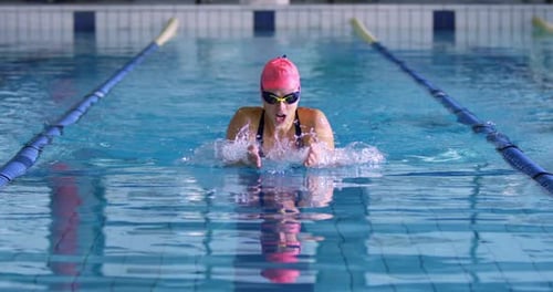 Swimmer training in a swimming pool