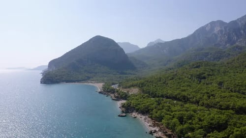 Aerial View of Sea and Coastline Covered with Tropical Forests