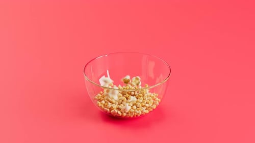 Realistic Popcorn Popping in Glass Bowl Animation