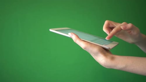 Girl Writing Message On Tablet Isolated On Chroma Key Green Screen Background