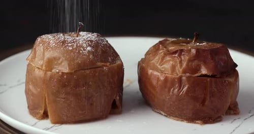 Baked Apples Sprinkled with Confectioners Sugar