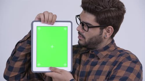 Enthusiastic Man Holding Tablet With Chroma Key Screen