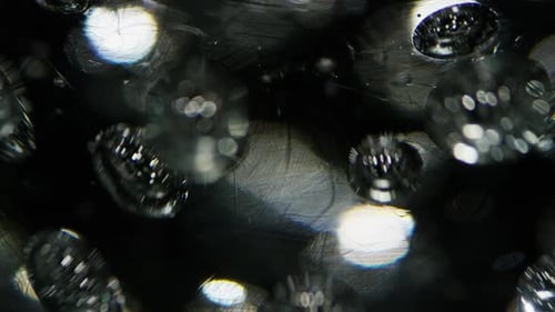 Macro Shot of Sparkling Water Droplets on Surface