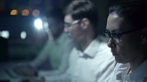 Cyber Security Team Working at Night