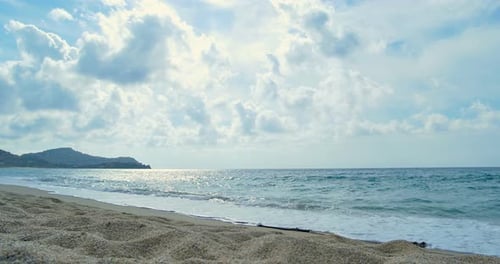 Waves Landing on Sandy Beach Clear Blue Water