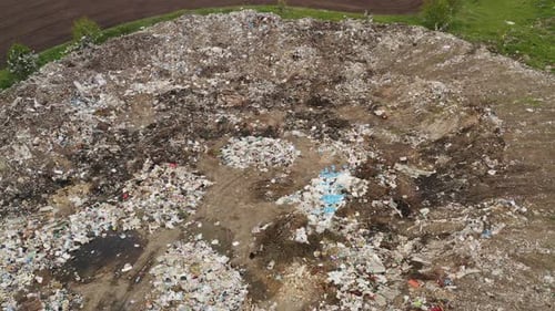Garbage Dump Near Agricultural Field, Aerial View