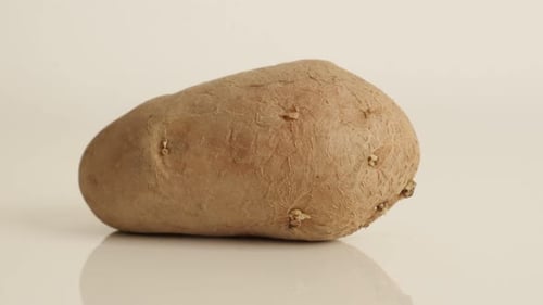 Potato Close Up on White Surface
