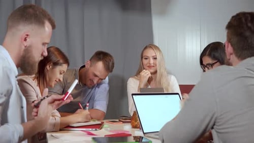 Blonde Woman Office Worker Is Performing at Working Meeting