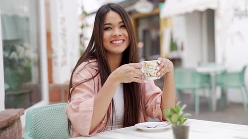 Happy Woman with Cup of Coffee