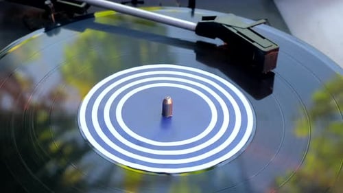 Vinyl Record Spinning on a Turntable, Close Up