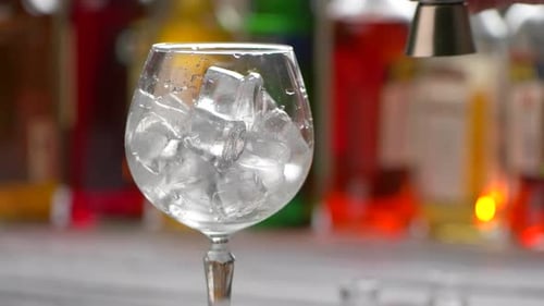 Ice and Water in a Glass at a Bar