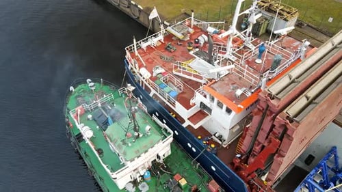 Industrial Ships Docked in Active Port