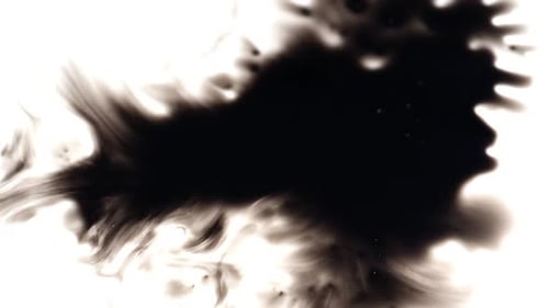 Black Ink Spreading on White Surface Abstract