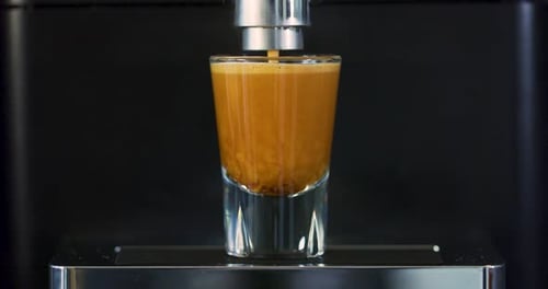 Making Strong Espresso at Exclusive Coffee Machine