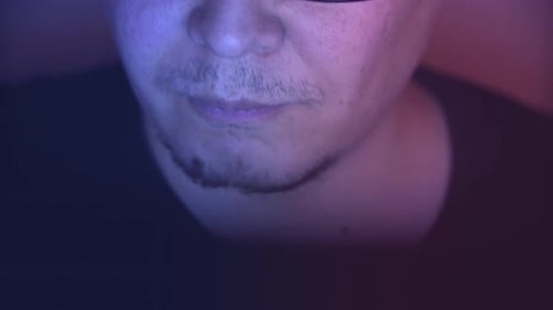 Man with Glasses Working on Computer, Close Up