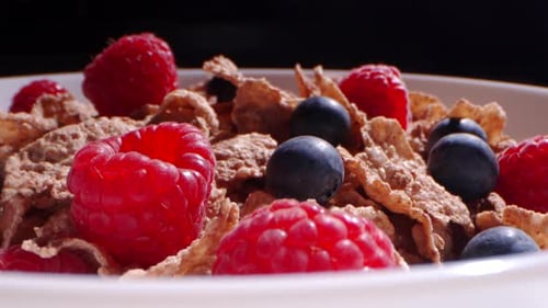 Breakfast Cereal with Fresh Raspberries and Blueberries