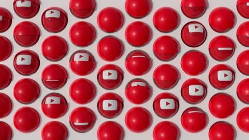 Animated Red Spheres Revealing YouTube Play Buttons