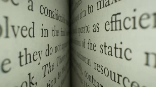 Close-up of Open Book with Dense Text