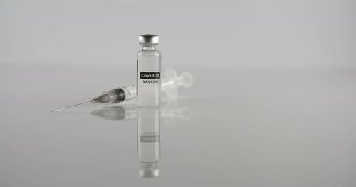 Covid-19 Vaccine Vial and Syringe Close Up