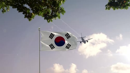 South Korea Flag Waving with Airplane Flight Over City Skyline