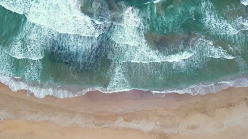 High and powerful waves coming fast to the beach, waves in winter day