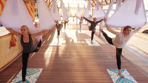 Aerial Yoga Class in an Open-Air Studio